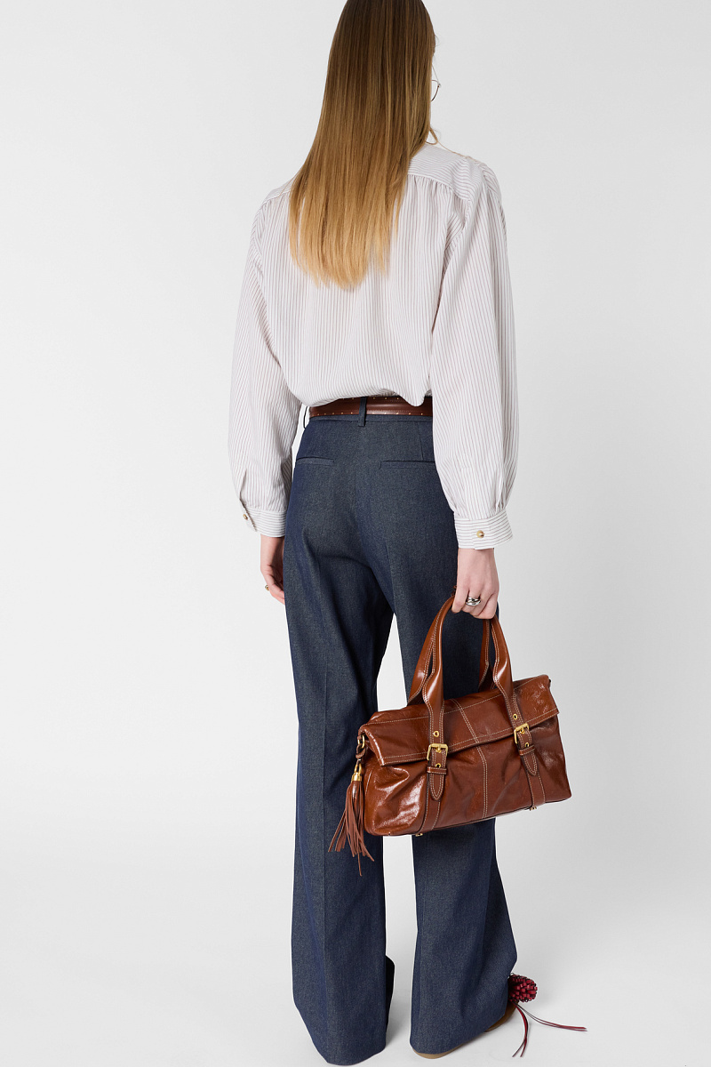 Брюки расклешенного кроя со стрелками